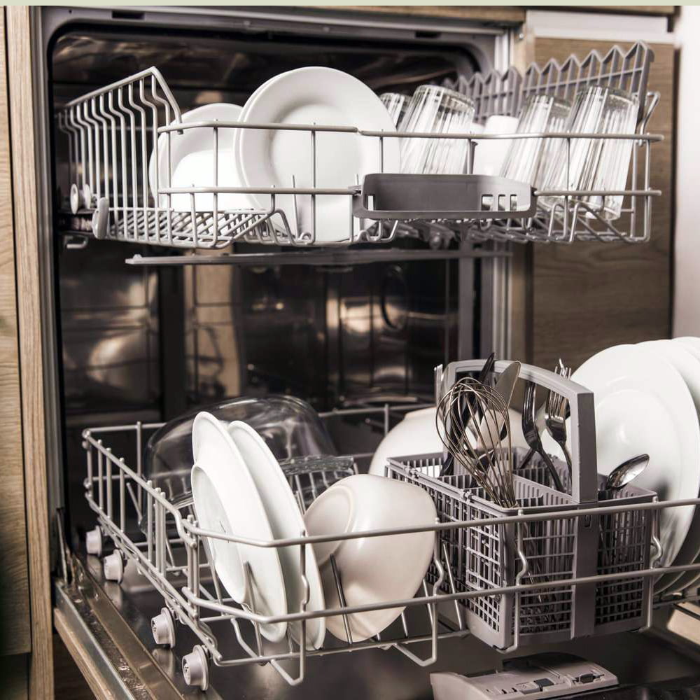Spotless dishwasher showcasing clean and gleaming dishes.